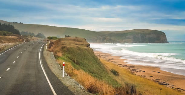 istock Empty road along New Zealand coast 922705914