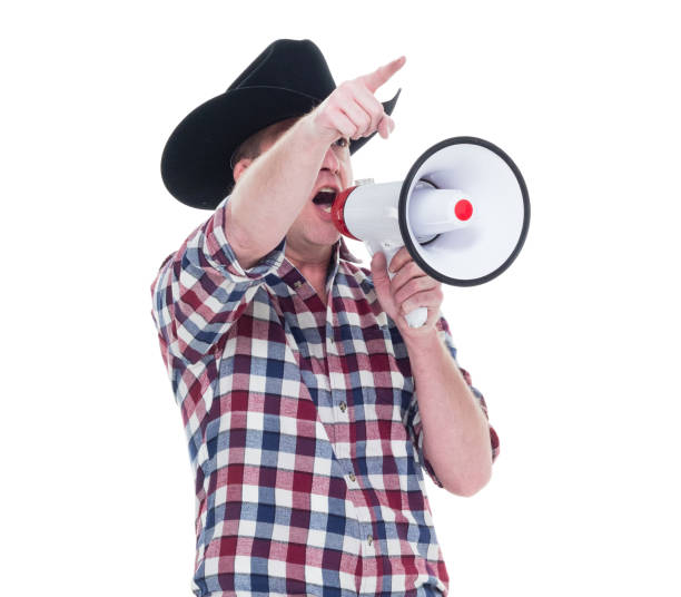 istock Man holding megaphone and yelling 922706020