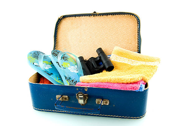 istock Suitcase with sandals, field-glasses and towels 92270707