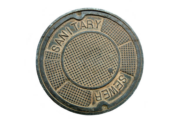 istock Heavy metal sewer cover on a white background 92270915