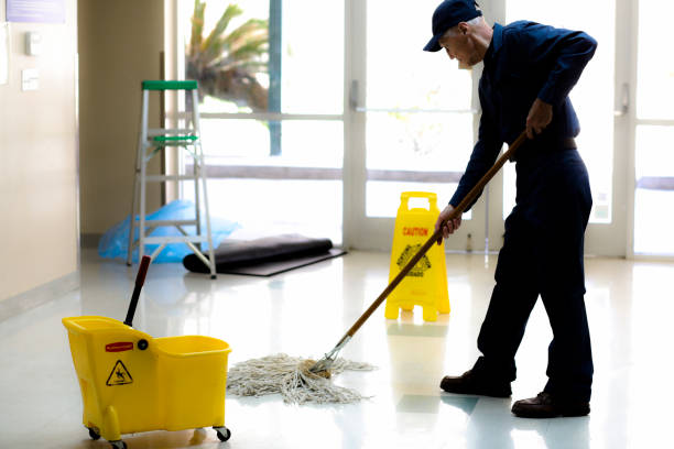 full length image of senior man working as a janitor in building. - caretaker imagens e fotografias de stock