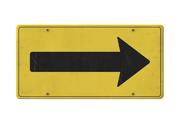 Photo of Isolated old yellow arrow sign