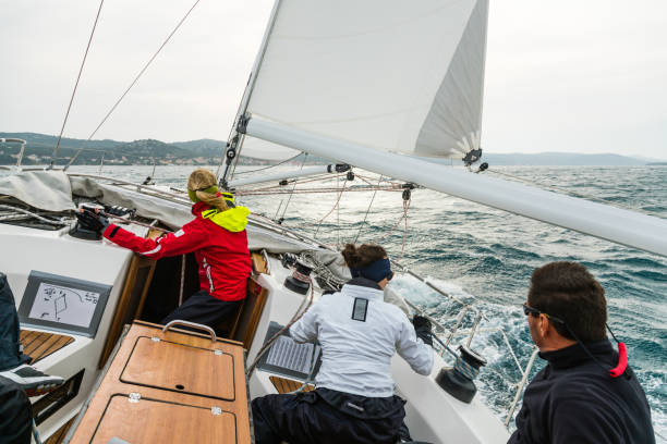istock Group of People Sailing on Rough Sea 922714016