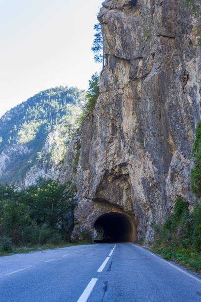 istock View of the road in the valley between the mountains. 922715224