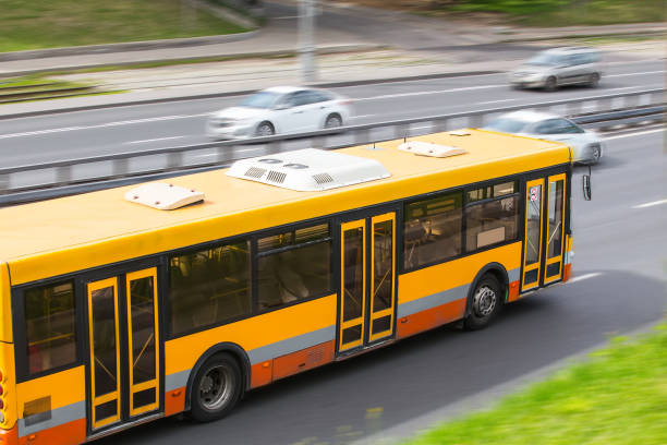 istock bus is moving along the street 922715428