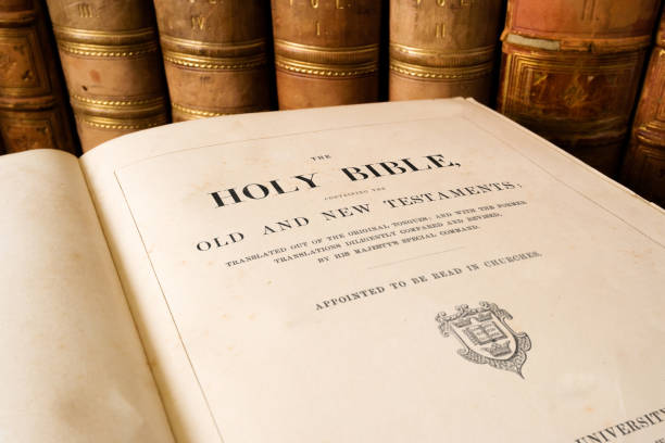 istock The Antique Holy Bible open at title page 922716282
