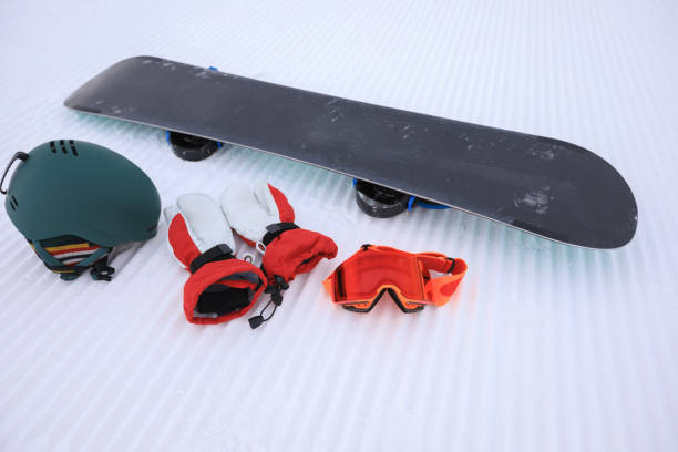 istock Equipment for snowboarding on track lines at ski slope left by a snowcat 922716938