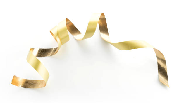 istock Golden ribbon roll isolated on white background 922716970