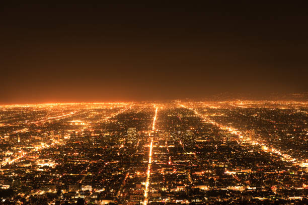 los angeles traffic. cityscape panorama at night - hollywood california skyline city of los angeles panoramic imagens e fotografias de stock