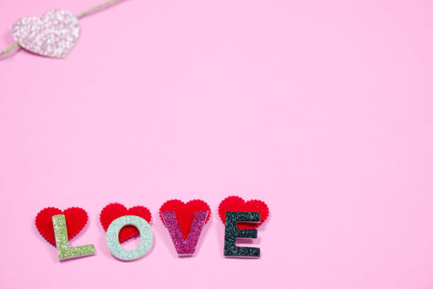 istock Love concept absract background with mini red heart on pink background included copyspace for add text or graphic 922721658