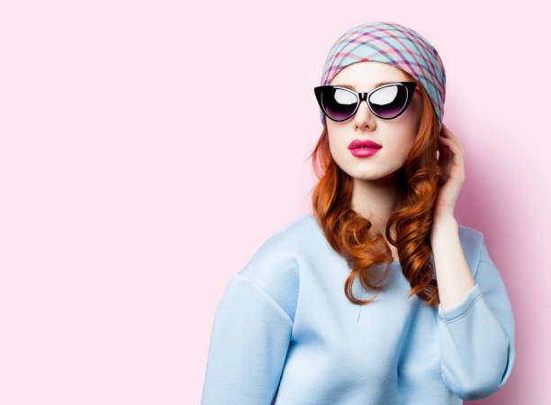 istock Young redhead girl in beautiful blue clothes 922721822