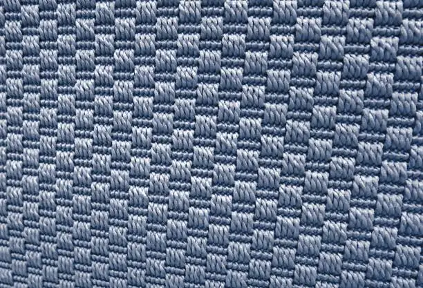 Textile Texture, Close Up of Blue Weaving Fabric Pattern Background with Copy Space for Text Decoration.