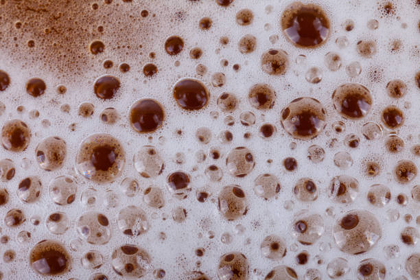 istock Jug of blonde beer with white foam 922723880