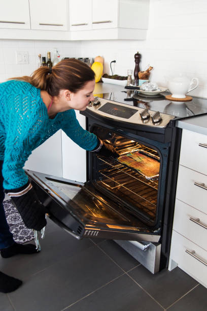 istock Girl making reusable eco-friendly food wrap. 922724182