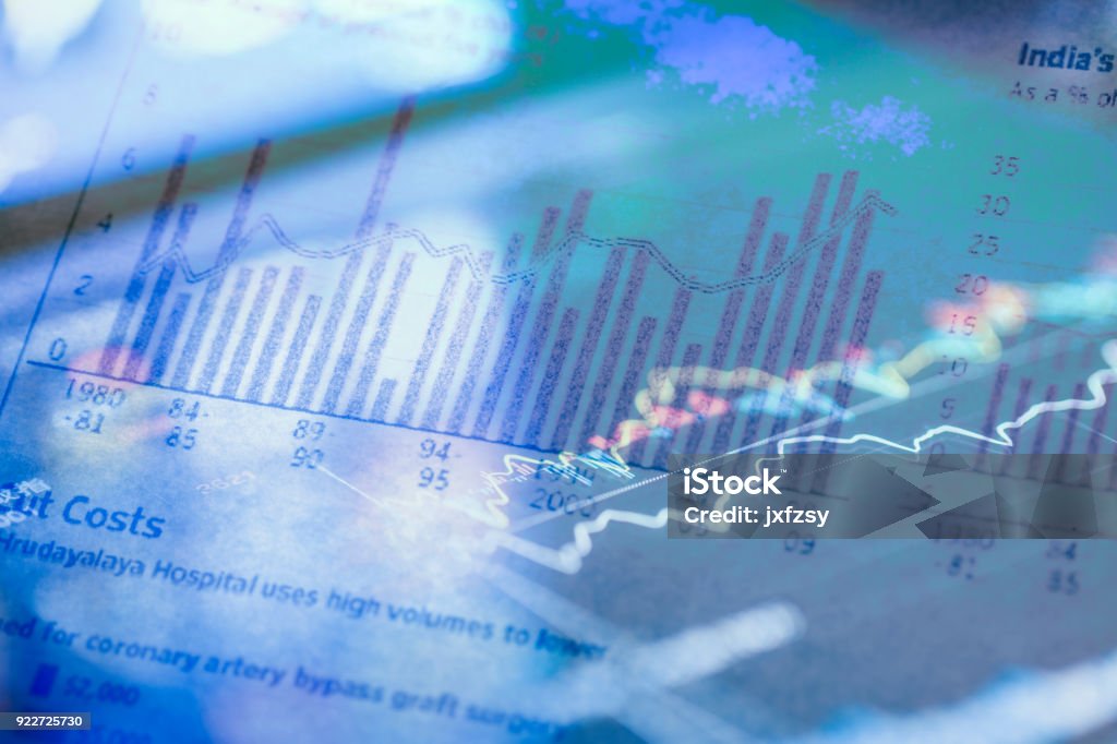 histogram graph with stock market chart data Analyzing Stock Photo