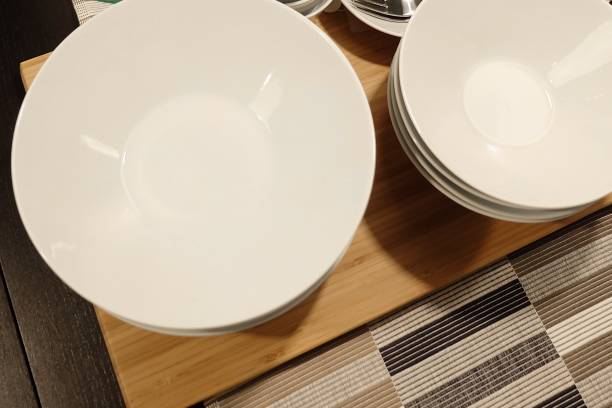 istock Set of Porcelain Plates, Bowls and Silverware 922726648