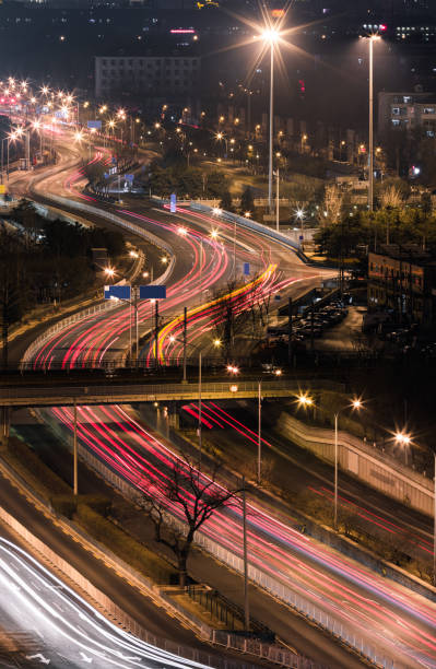 istock City night view S shape car taillight trajectory 922728138