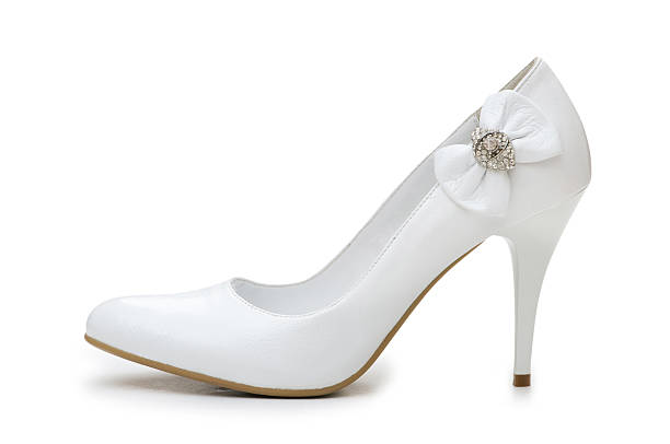 Closeup shot of a bride's wedding shoes