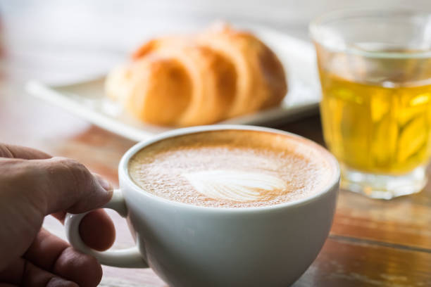 istock coffee and cake on a wooden table, breakfast 922730852