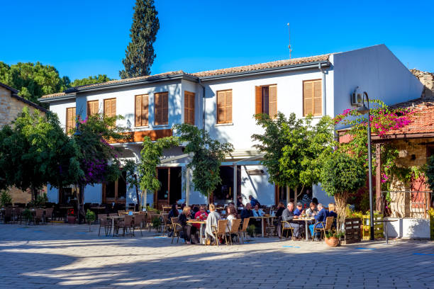 NICOSIA, CYPRUS - DECEMBER 3: People at street cafe on Selimiye square.
