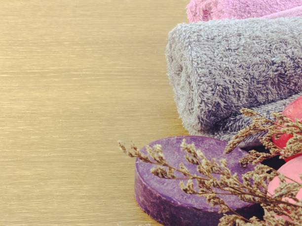 istock colorful hand made soap with towel on space background 922737046