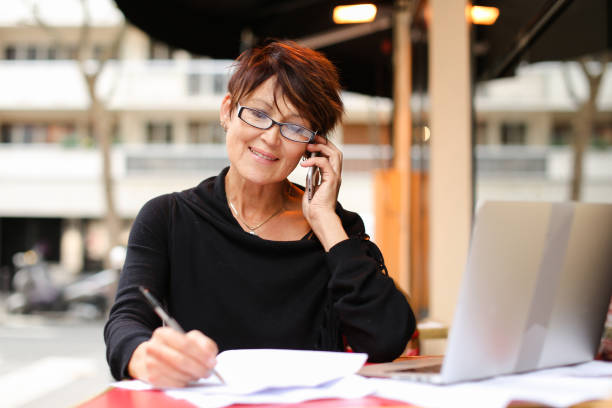 istock Female accountant remotely working in modern la 922737316