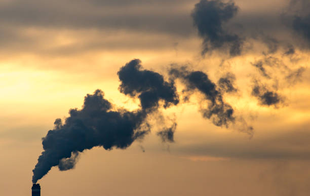 istock Smoke from the pipes in the factory 922737496
