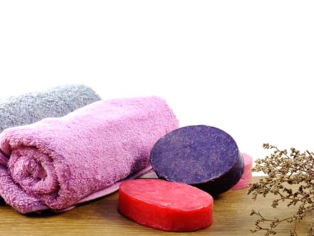 istock colorful hand made soap with towel on white space background 922737672