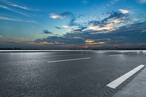 istock Asphalt road and sky cloud landscape at sunset 922738234