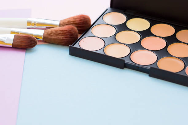 istock Cosmetic products on pastel colors background 922738486