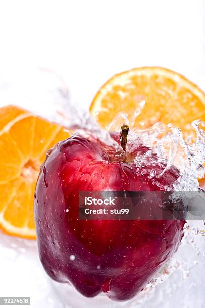 Apple E Arancione A Spruzzo - Fotografie stock e altre immagini di Acqua - Acqua, Alimentazione sana, Antiossidante