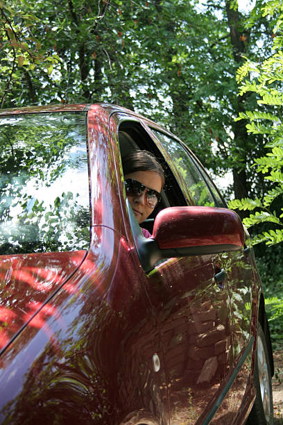istock Young Woman In A Car 92274695