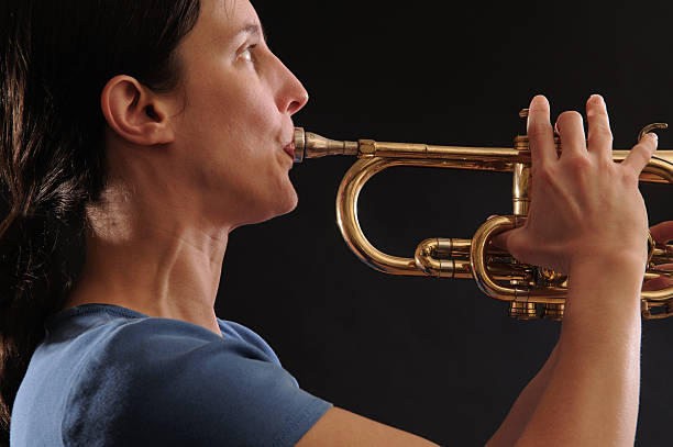 istock woman playing trumpet 92274795