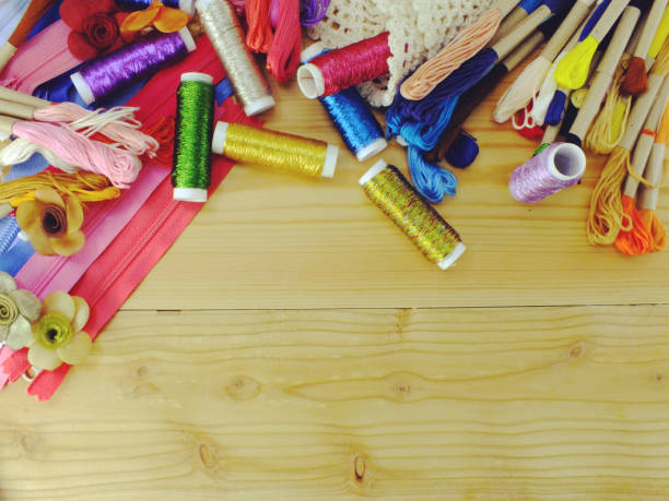 istock equipment for sewing accessories for handmade sewing kit border background with copy space; 922751546