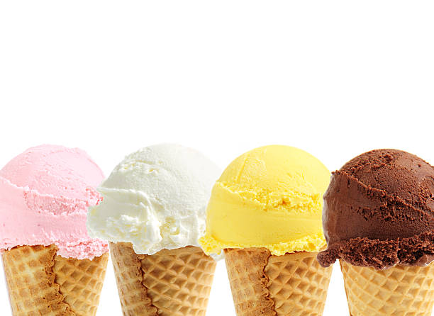 Four different ice creams in cones stock photo