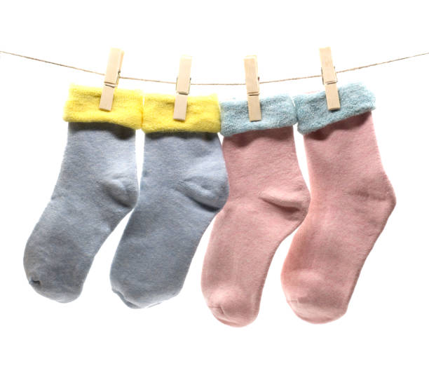istock female socks on white background 922753282