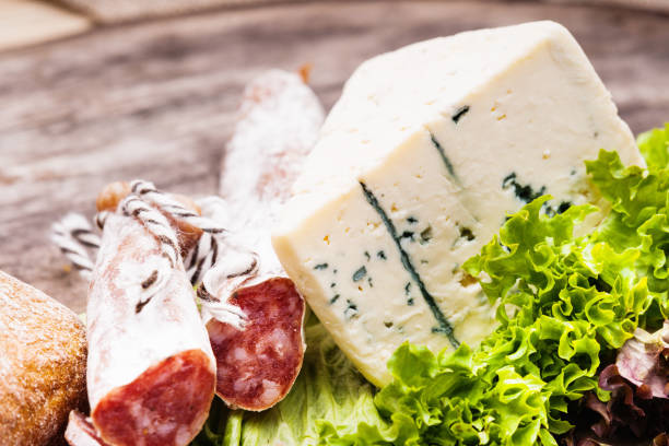 istock Sausage salami with noble mold, vegetables, cheese and bread bun 922753896