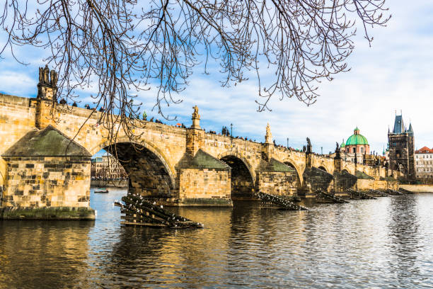istock The Charles bridge under a winter blue sky 922755216