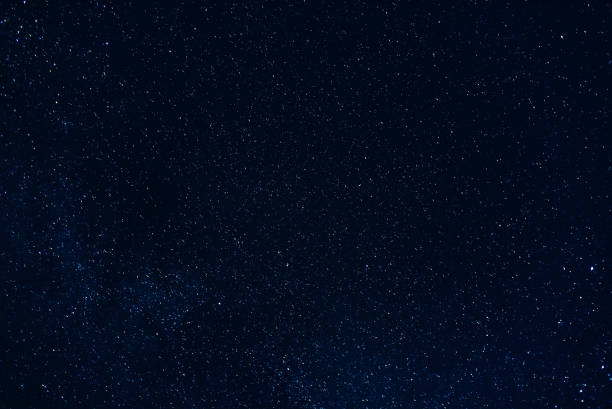 istock background of starry dark night sky 922755582