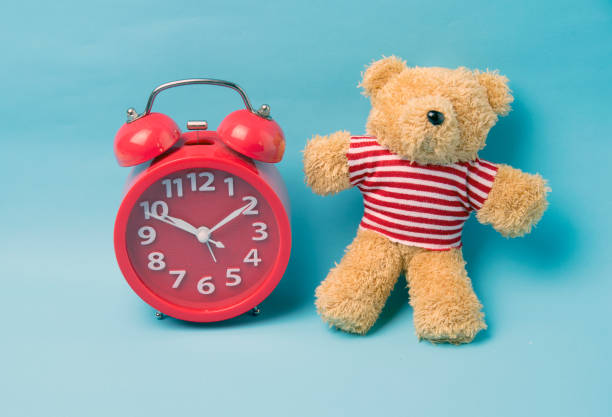 istock Little teddy bear , a valentine's gift for lover isolated on light blue background 922756970