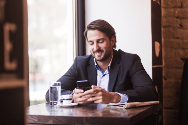 istock Bearded businessman enjoy coffee break in cafeteria 922757266