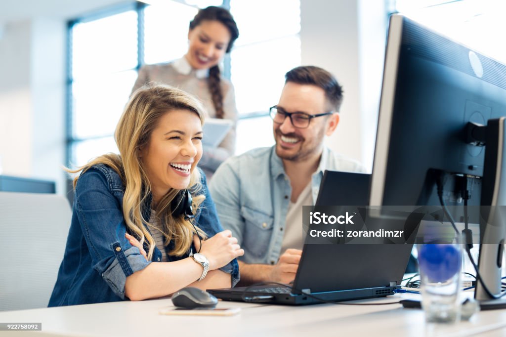 Group of business people and software developers working as a team in office Teamwork Stock Photo