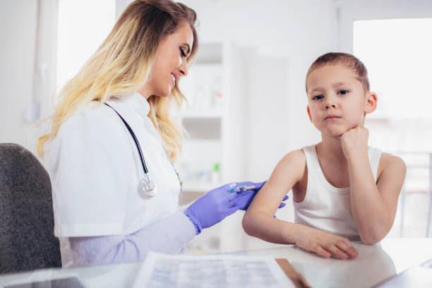 istock Doctor doing vaccine injection to a child 922759228