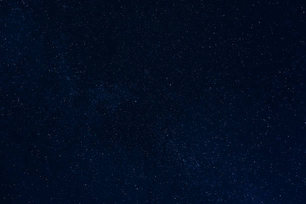 istock background of starry dark night sky with stars 922759474