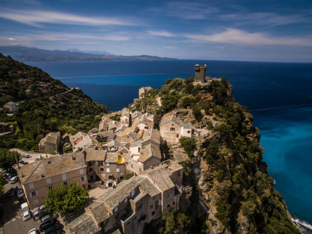 Aerial view of the beautiful village of Nonza, in Cap Corse, Aerial view of the beautiful village of Nonza, in Cap Corse, Corsica, France haute corse photos stock pictures, royalty-free photos & images
