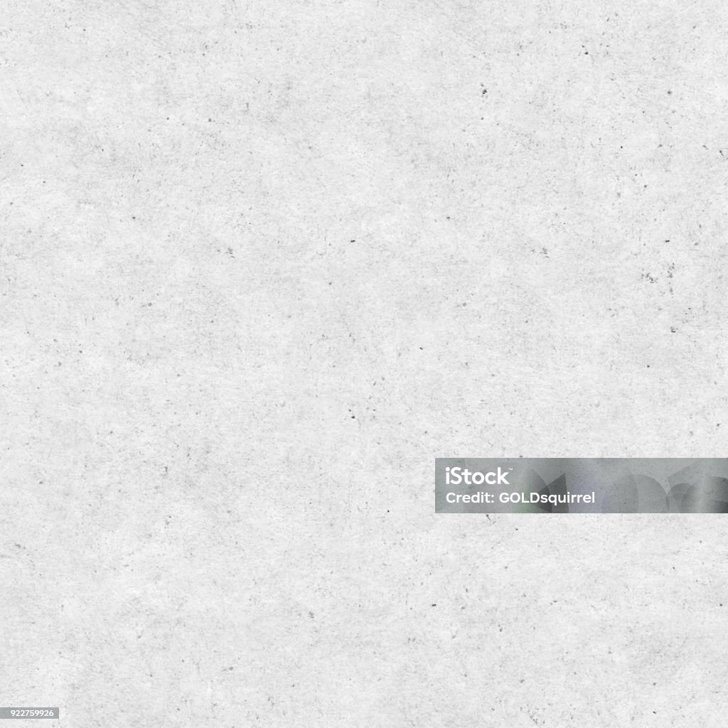 Seamless modern handmade polluted light gray handmade paper with visible structure and imperfections Very light gray paper background. High detailed file - zoom to see the details - dots spots and all imperfections and gradient stains.  Textured Effect Stock Photo