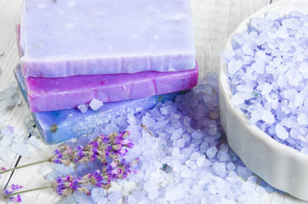 istock Natural soap, lavender, salt on a wooden board, hygiene items fo 922759996