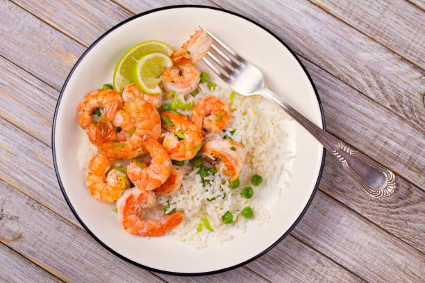 istock Shrimps with ginger rice and green peas 922763088