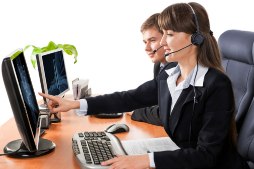 Young woman working as call center representative.
