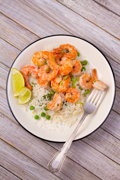 istock Shrimps with ginger rice and green peas 922764490